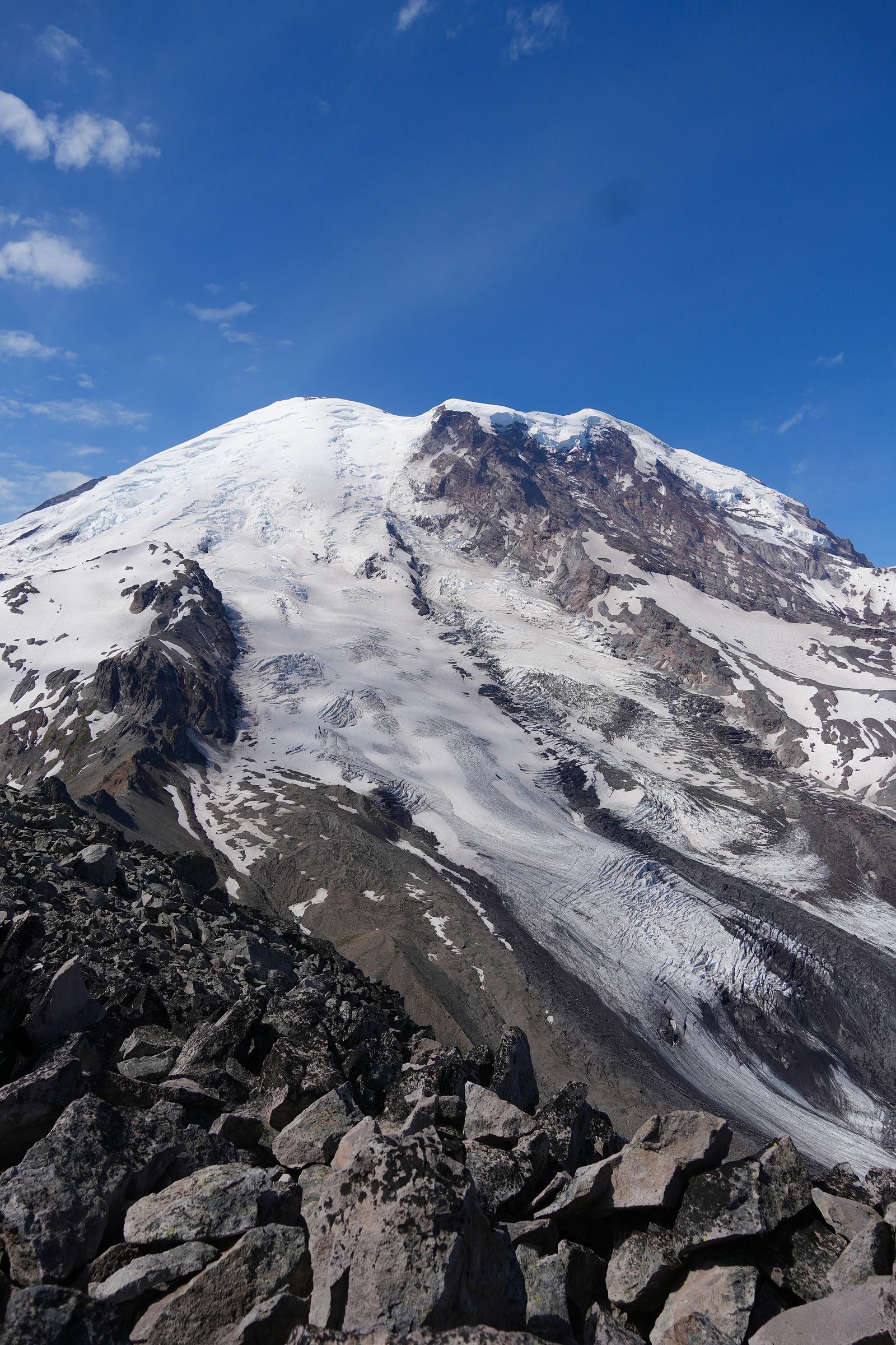 Mount Rainier and its glaciers above angular rocks, Sunrise
