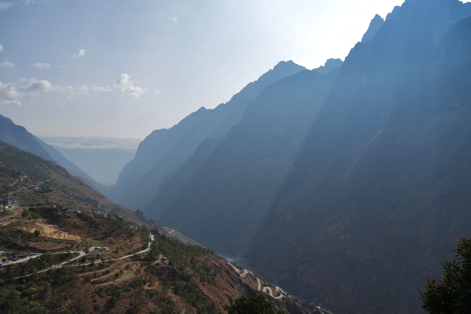Tiger Leaping Gorge above winding roads and terraced slopes
