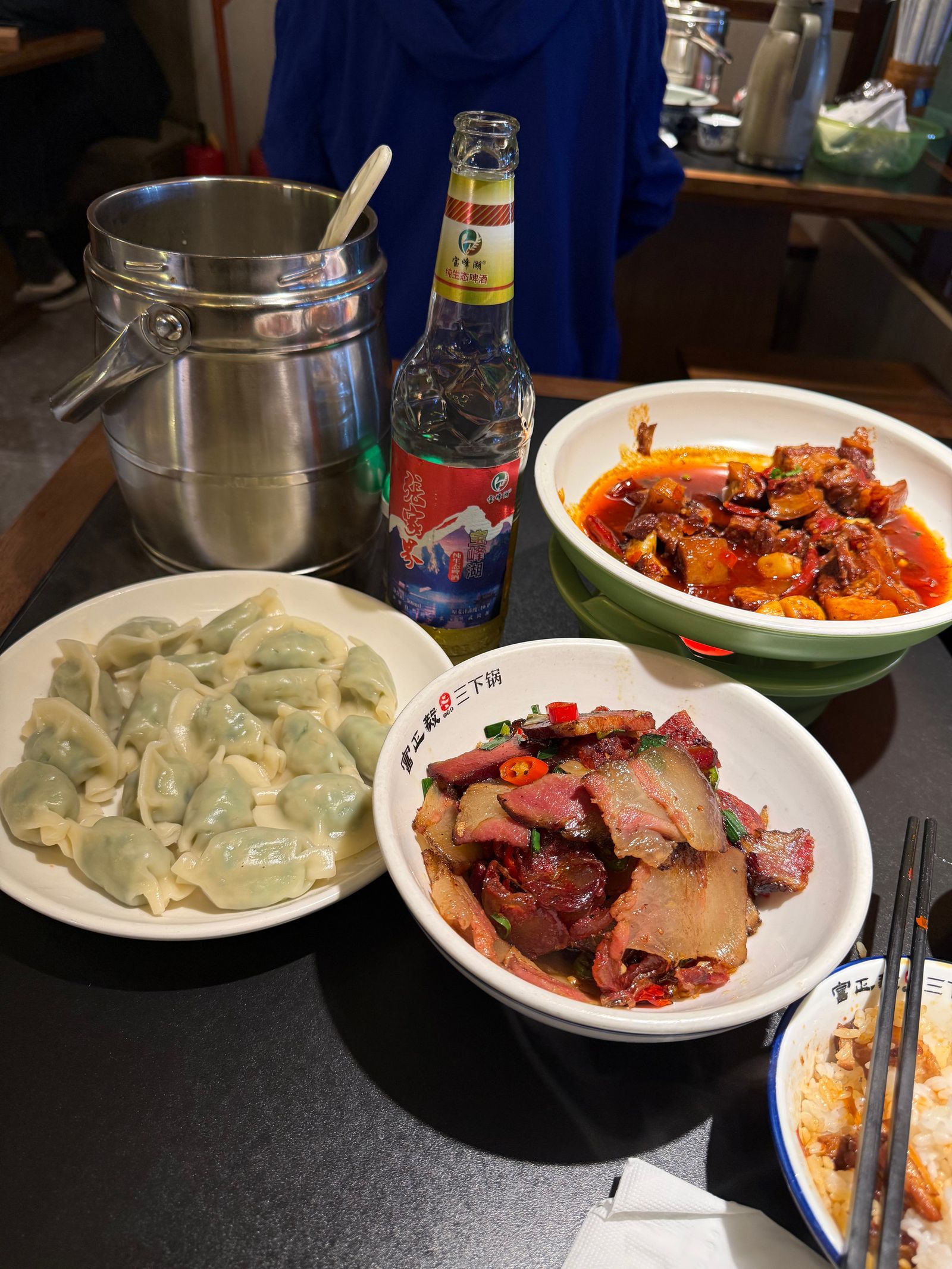 Dumplings and meat dishes with rice and chopsticks, Zhangjiajie